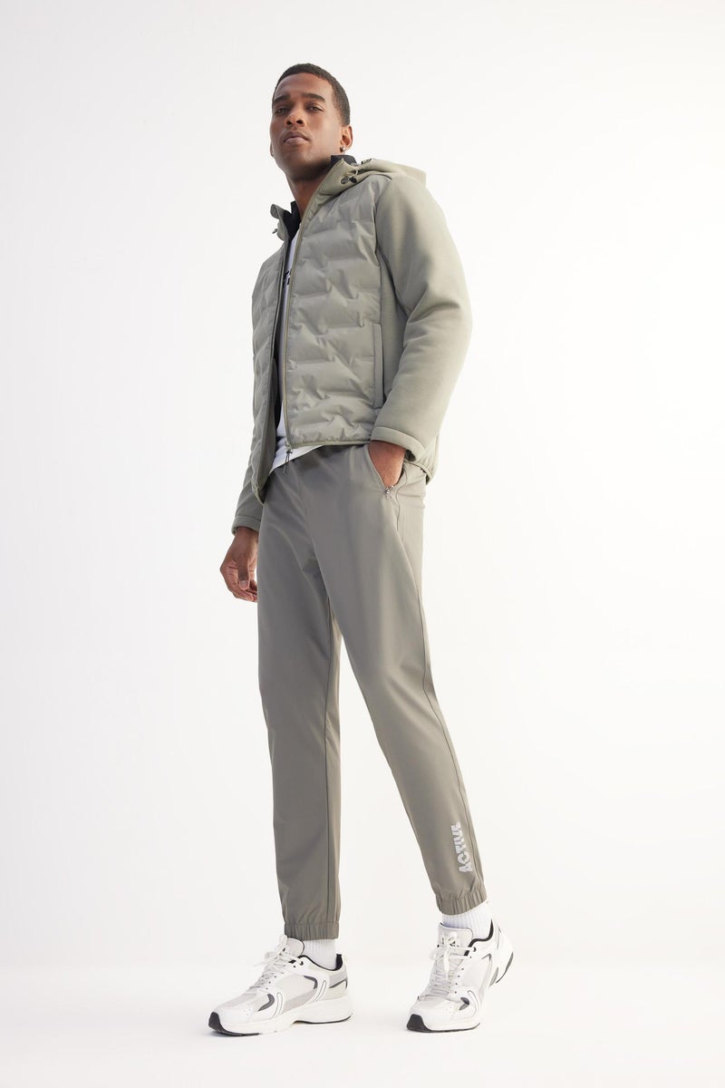 DeFacto Green Man DeFactoFit Slim Fit Double Pocket Woven Sports Joggers Casual - Image 1